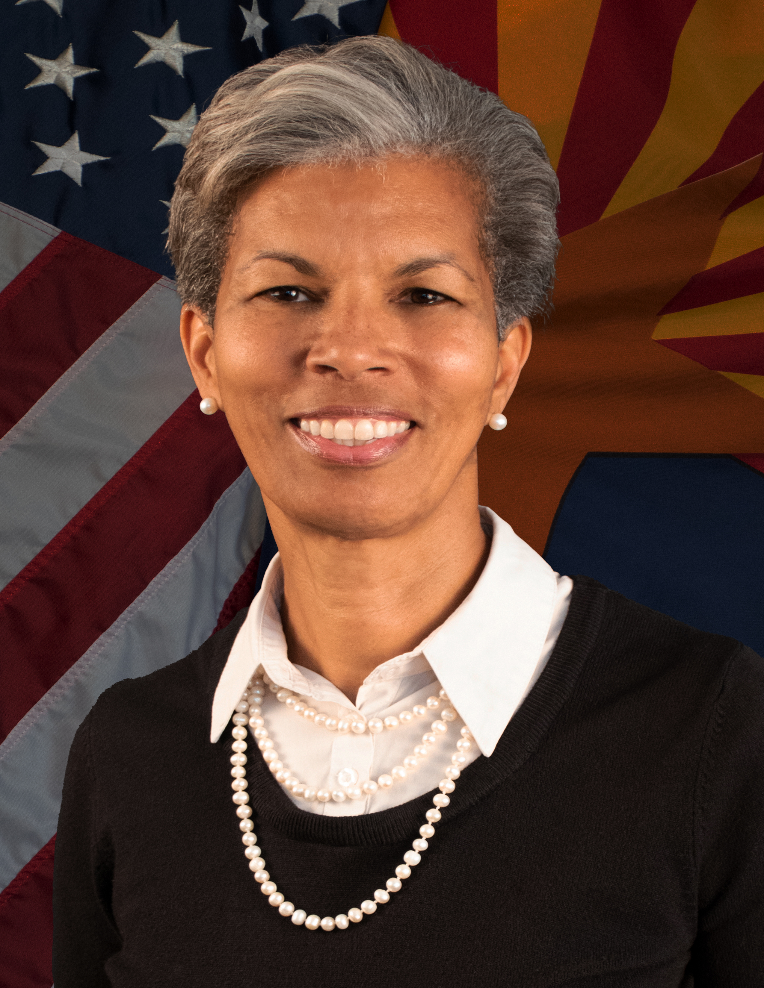 Picture of Wanda Wright in front of US and AZ flags